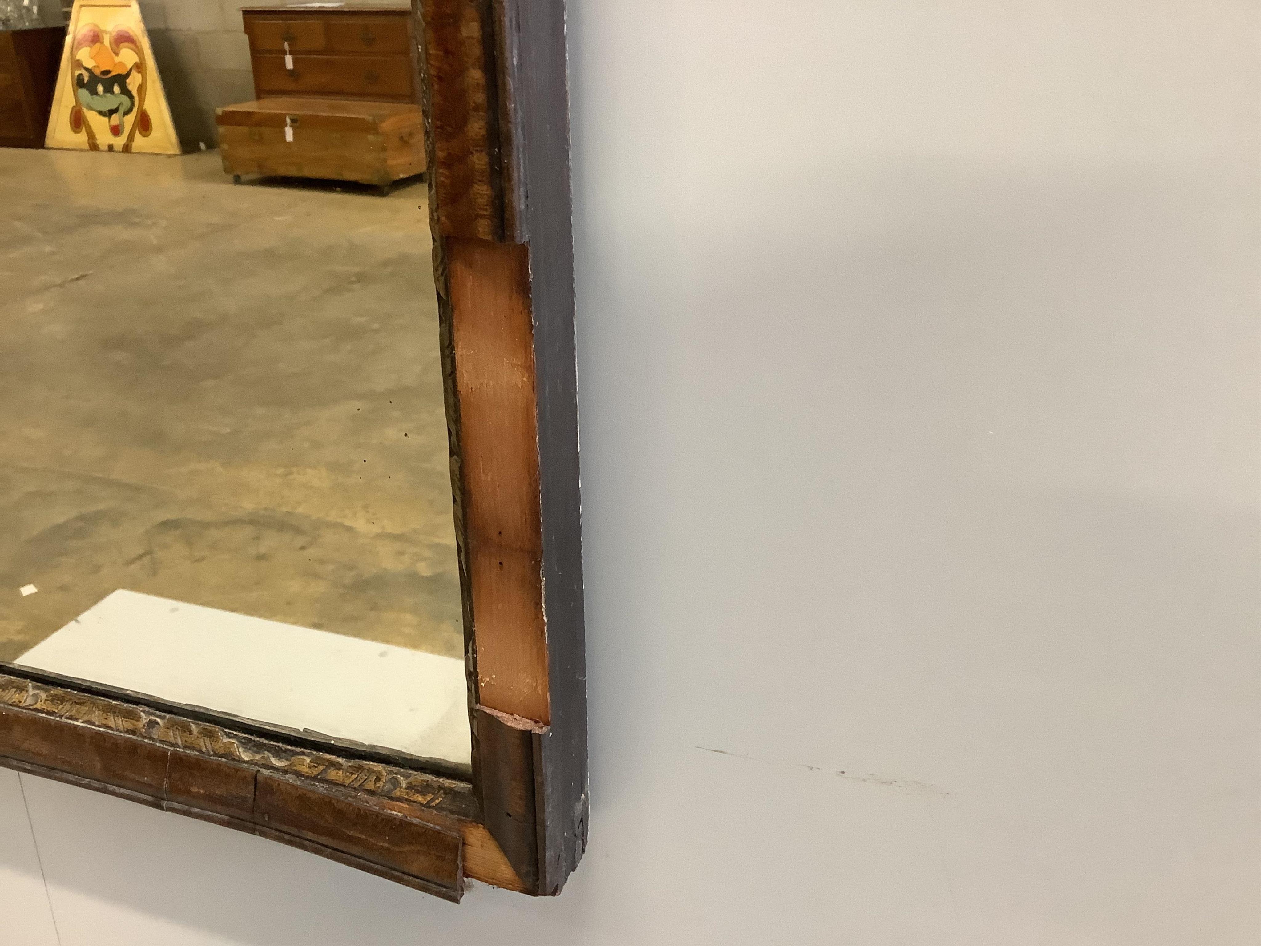 An 18th century style mahogany fret cut wall mirror, with painted decoration, width 51cm, height 124cm. Condition - poor